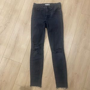 Dark gray Madewell skinny jeans with knee rips. Size 26